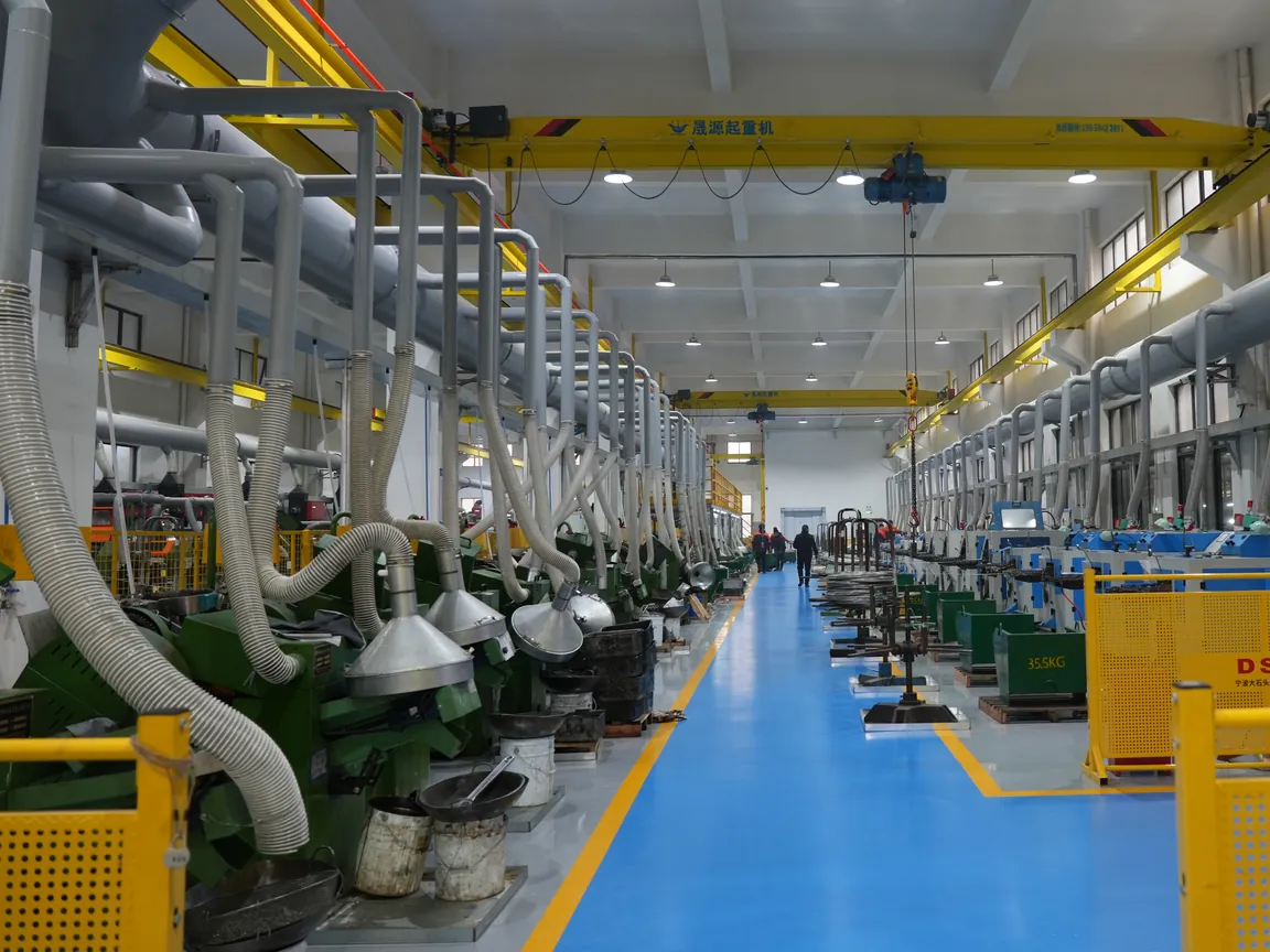 Shop floor photo (OEM line narrative, not install-node): production aisle for custom programs